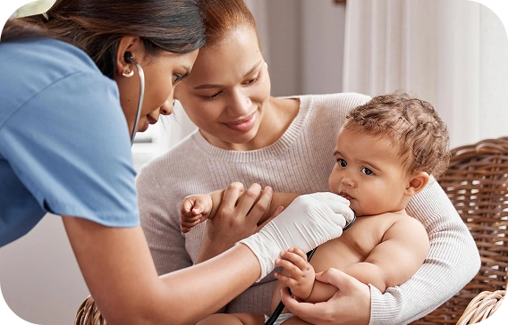Mother breastfeeding her baby with professional guidance